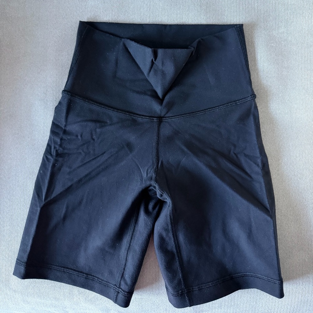 Aritzia TNA Action black legging shorts